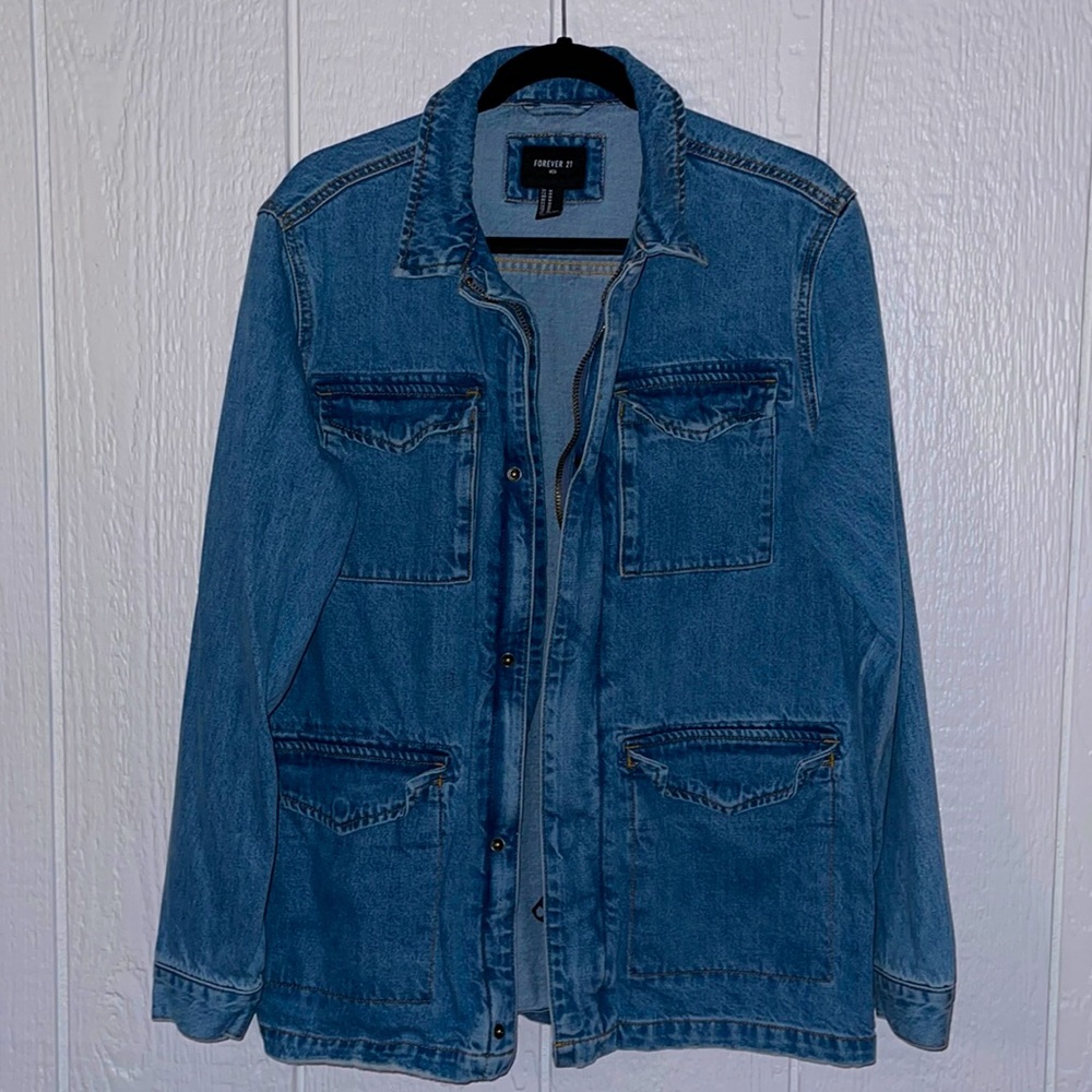 It’s button up/zipper denim blue jacket in good conditions.